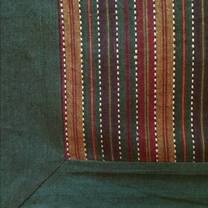 Dark green placements and napkins.